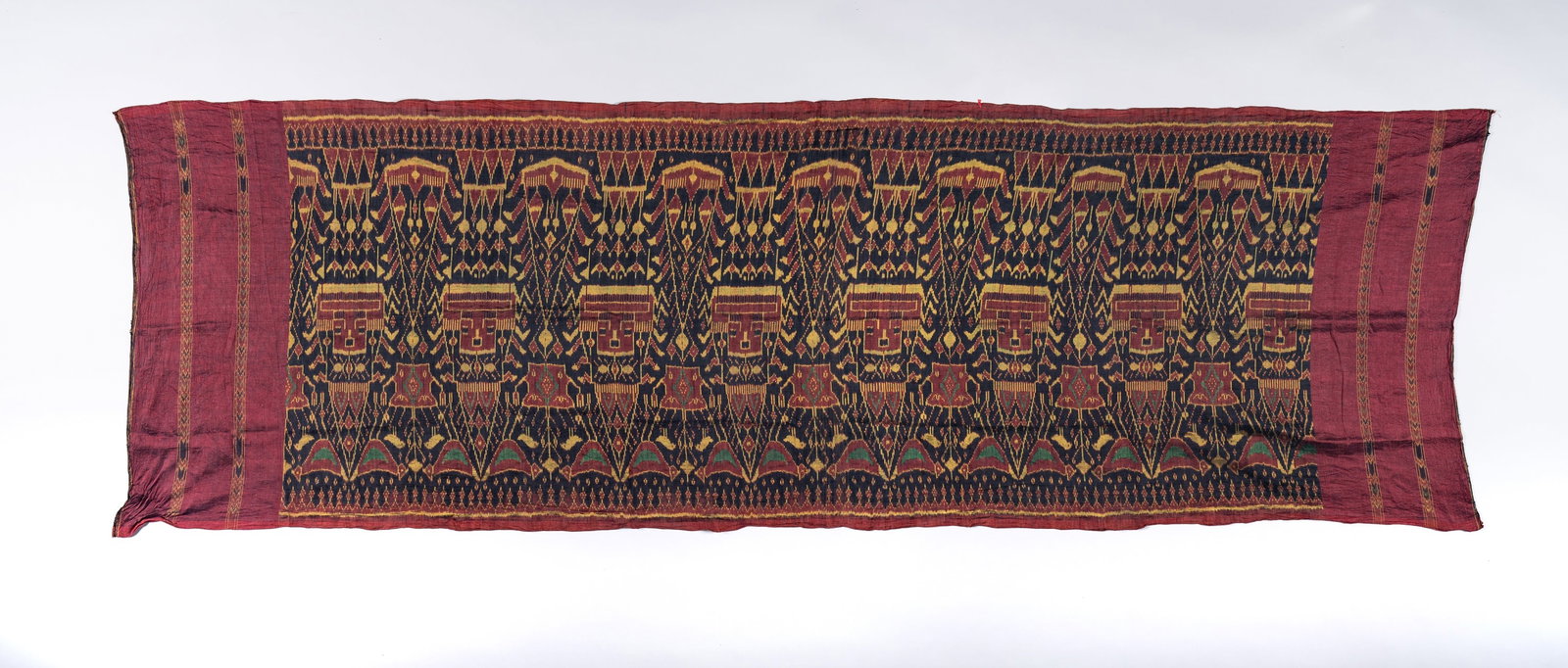 A KHMER SILK HOL PIDAN (CEREMONIAL HANGING): A KHMER SILK HOL PIDAN (CEREMONIAL HANGING) Cambodia, Kampot Province, Takev (Takeo), Khmer people, 1900s. Finely woven with repeated rows of Buddhist elements and motifs. Provenance: