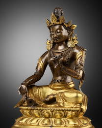 A GILT BRONZE FIGURE OF TARA