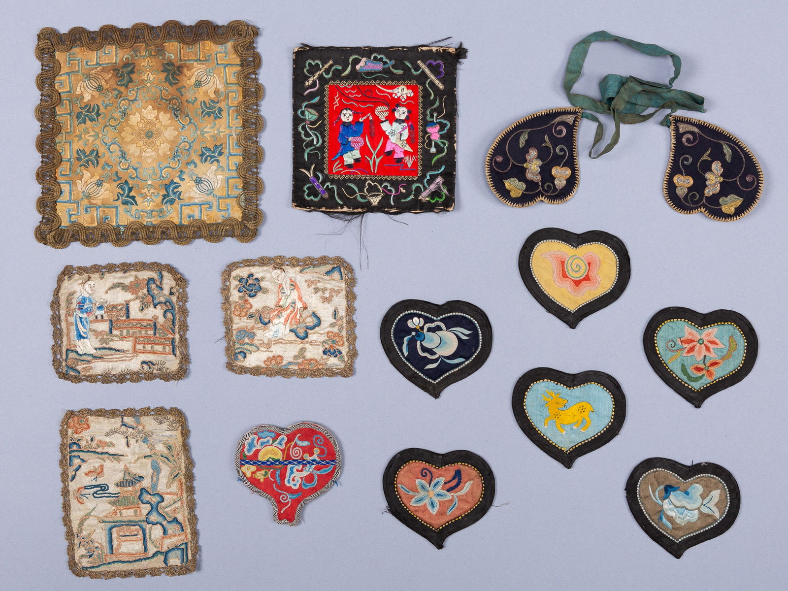A GROUP OF FOURTEEN EMBROIDERED SILK TEXTILES AND PATCHES, QING DYNASTY (1 of 5)