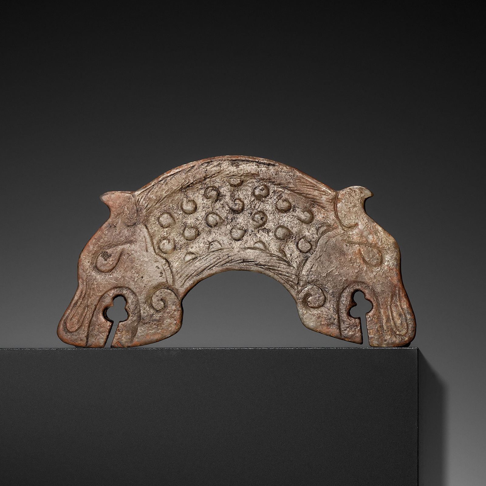 A PALE CELADON JADE 'DOUBLE-DRAGON' PENDANT, HUANG, WARRING STATES STYLE (1 of 8)