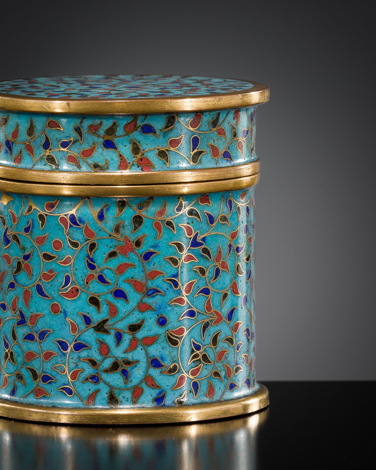 A CLOISONNE ENAMEL AND GILT-COPPER BOX AND COVER, MID-QING DYNASTY (1 of 7)