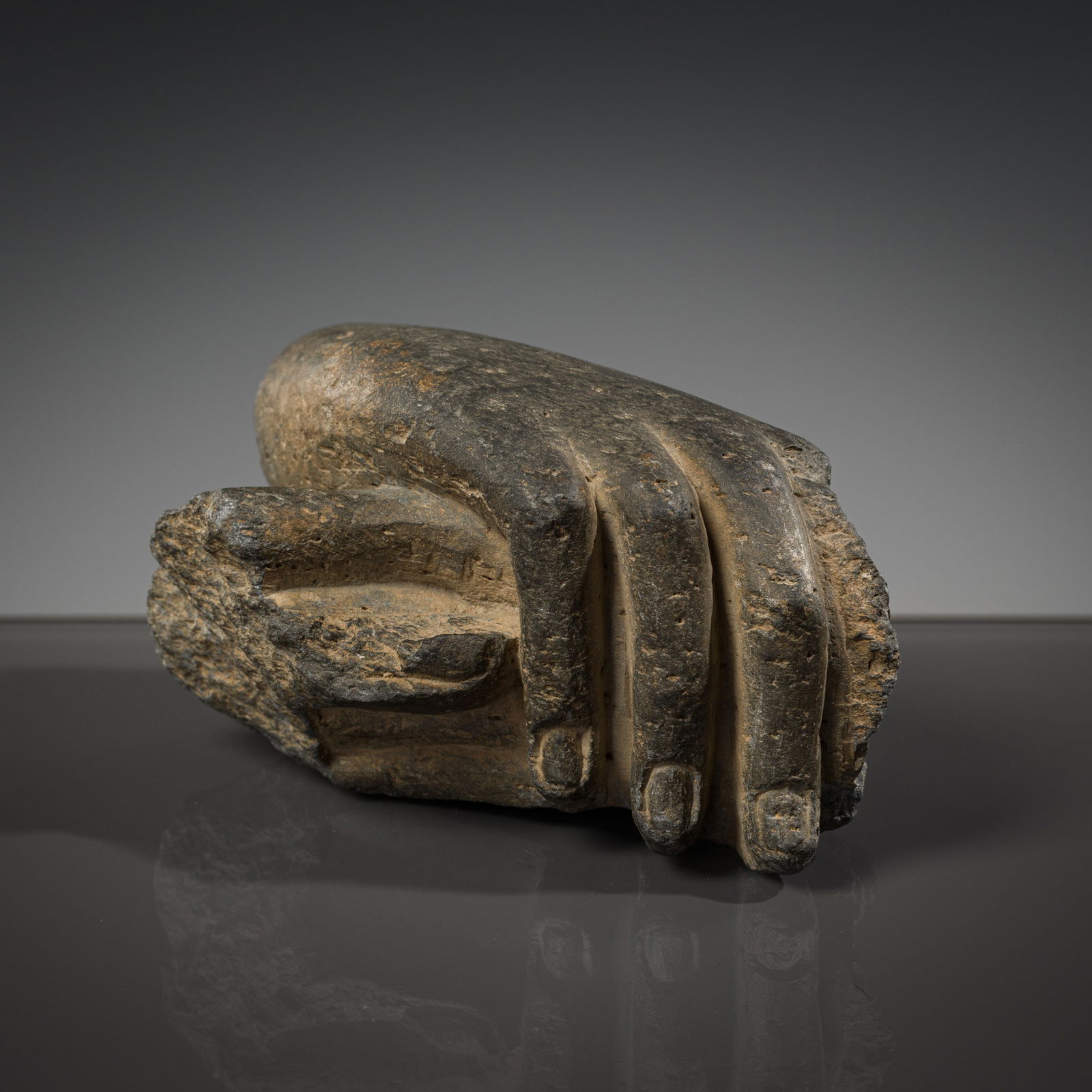 A GRAY SCHIST HAND OF BUDDHA, ANCIENT REGION OF GANDHARA, 2ND TO 3RD CENTURY (1 of 9)