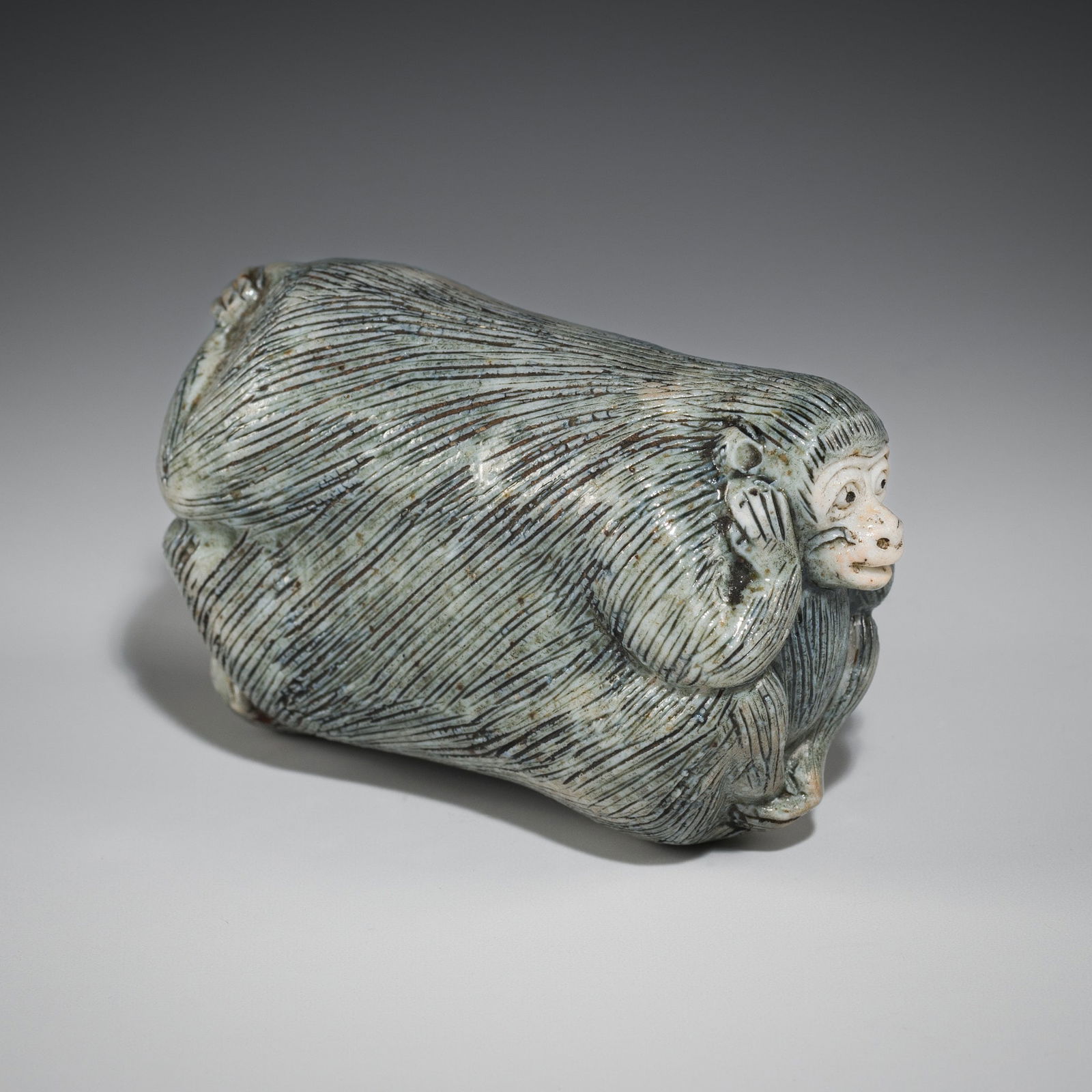 A LARGE PORCELAIN NETSUKE OF KIKAZARU AND IWAZARU (1 of 8)