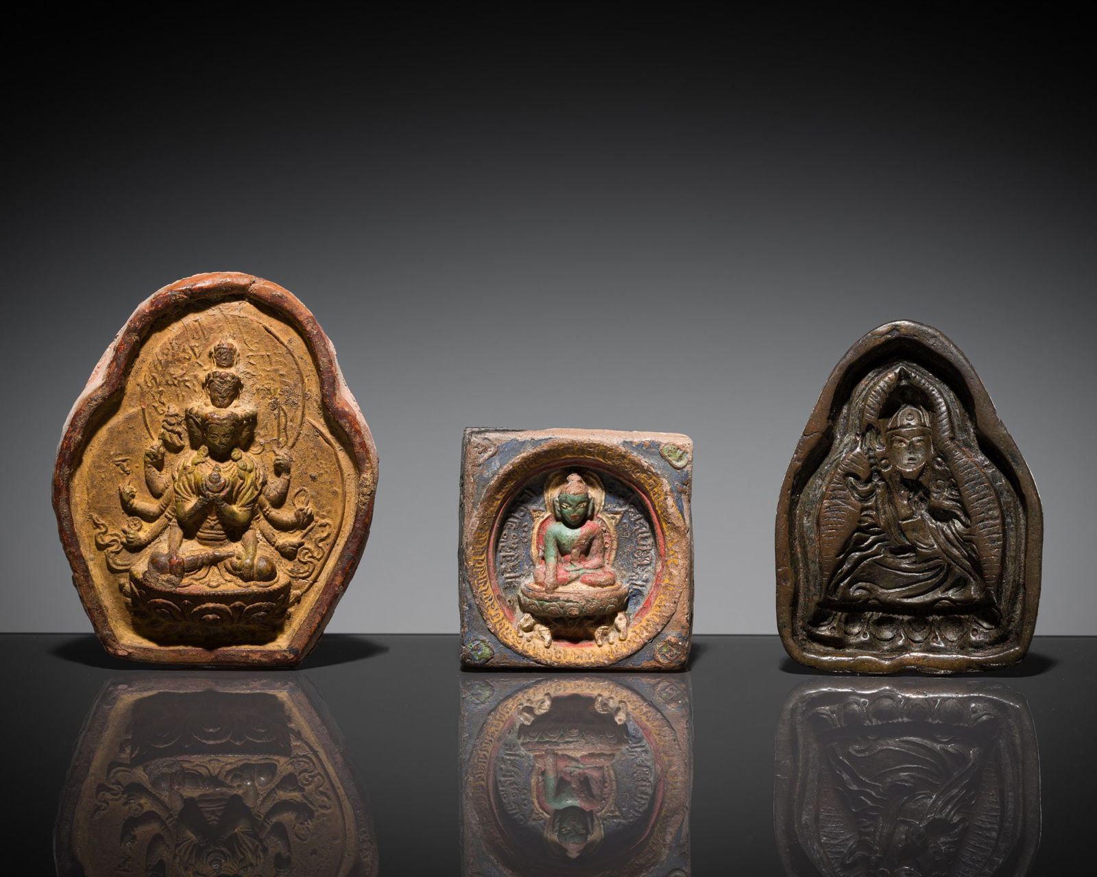A GROUP LOT WITH THREE RELIGIOUS RELIQUARIES, TIBET, 19th CENTURY (1 of 10)