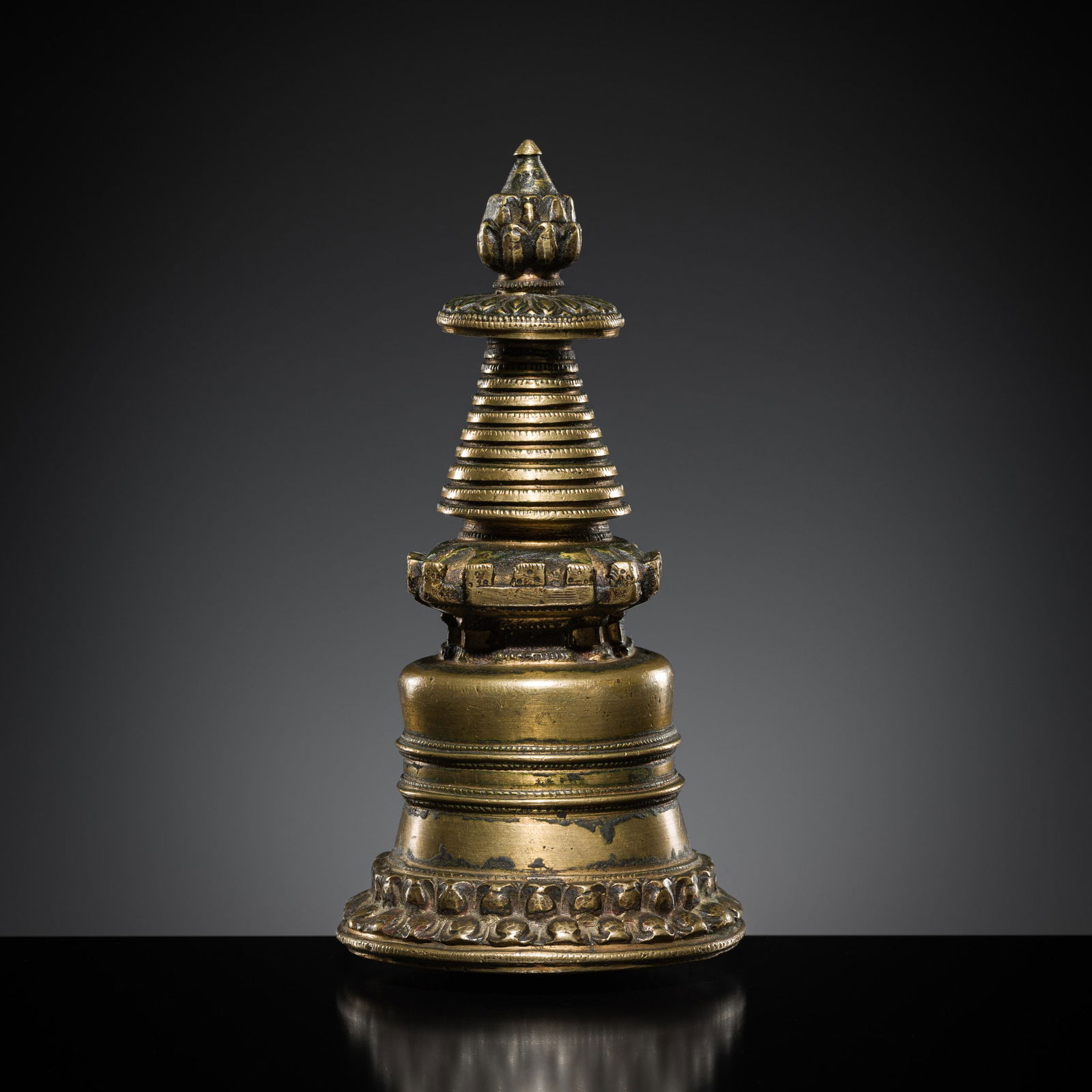 A BRONZE STUPA, KADAMPA STYLE, TIBET, 13TH CENTURY