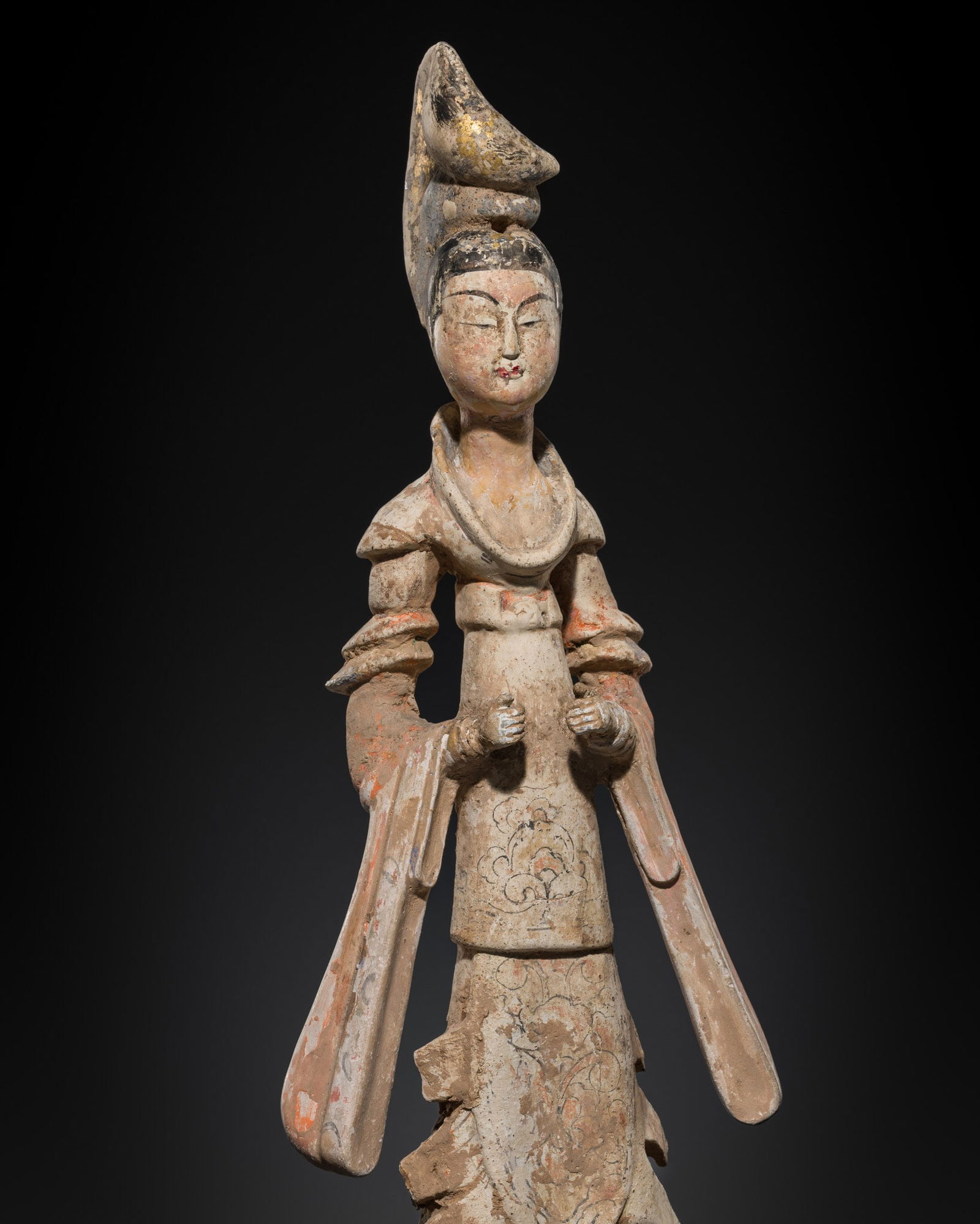 A PAINTED POTTERY FIGURE OF A STANDING COURT LADY, TANG DYNASTY (1 of 12)