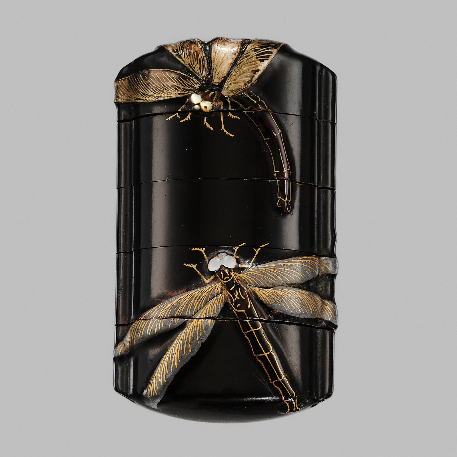 A FINE INLAID FOUR-CASE LACQUER INRO WITH DRAGONFLIES: A FINE INLAID FOUR-CASE LACQUER INRO WITH DRAGONFLIES Unsigned Japan, 18th century, Edo period (1615-1868) Of small upright rectangular shape, bearing a lustrous roiro ground, elegantly decorated with