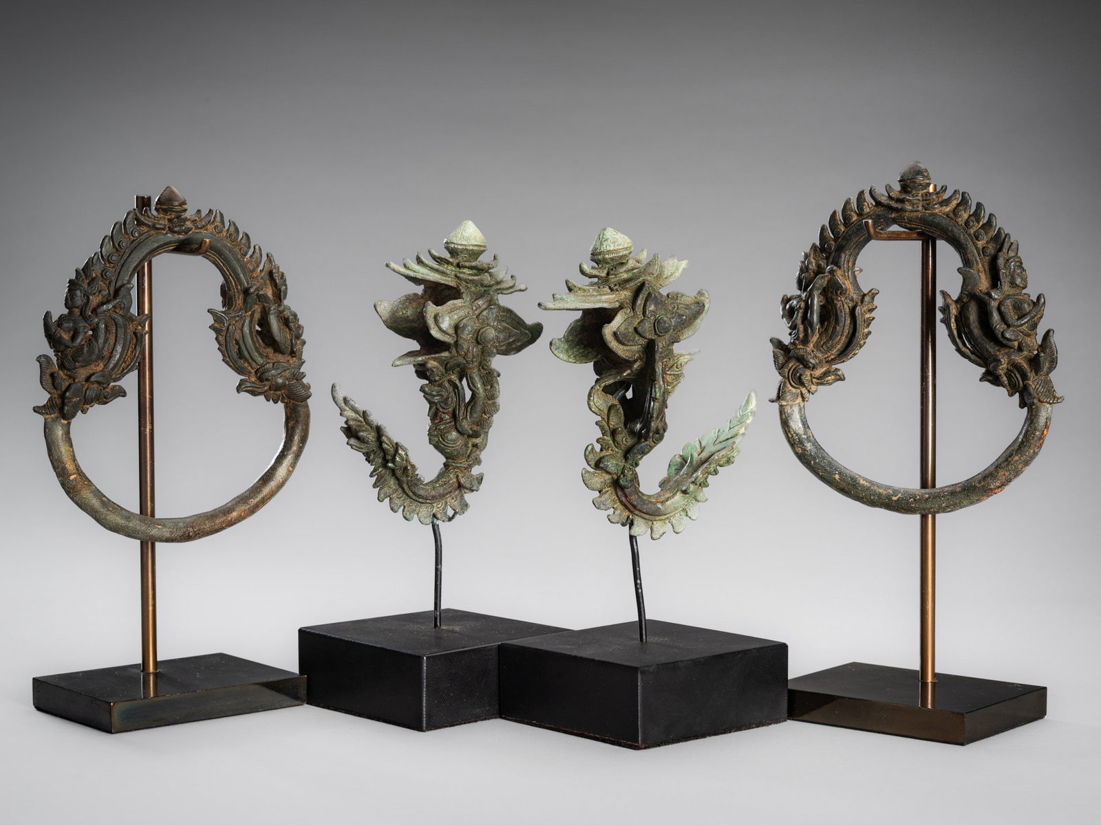 A FOUR-PART SET OF KHMER BRONZE PALANQUIN FITTINGS, BAYON STYLE, ANGKOR PERIOD (1 of 20)