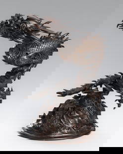 A BRONZE KORO COVER WITH A DRAGON AMID CRASHING WAVES: A BRONZE KORO COVER WITH A DRAGON AMID CRASHING WAVES Japan, 19th centuryFinely cast as a sinuous dragon emerging from a whirlpool of crashing waves, the scales of the beast neatly rendered, t