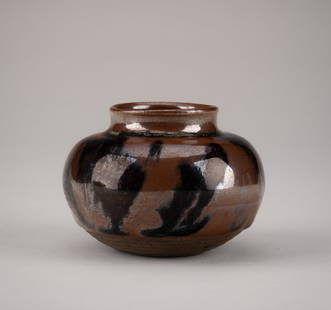 A TAIKAI SETO WARE GLAZED CHAIRE (TEA CADDY): A TAIKAI SETO WARE GLAZED CHAIRE (TEA CADDY) Japan, 18th century, Edo period (1615-1868)Of taikai ('vast ocean') form with a compressed globular body rising from a flat foot to a short neck and slight