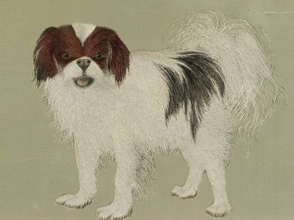 A FINE SILK EMBROIDERED PANEL DEPICTING A JAPANESE CHIN DOG: A FINE SILK EMBROIDERED PANEL DEPICTING A JAPANESE CHIN DOG Japan, Meiji period (1615-1868)Embroidered on a fine silk ground. Mounted on wood and set inside its original frame behind glass. The furry