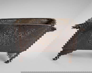 A BRONZE CENSER WITH PEONIES, c. 1900s: A BRONZE CENSER WITH PEONIES, c. 1900s China, late Qing Dynasty (1644-1912) to Republic period (1912-1949). The censer of rectangular form with incurved corners, set with two handles simulating thorne