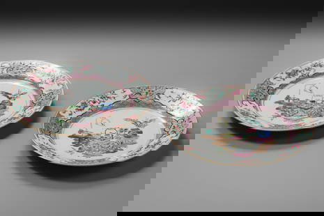 A PAIR OF FAMILLE ROSE 'ANTIQUE TREASURES' DISHES, 18TH CENTURY: A PAIR OF FAMILLE ROSE 'ANTIQUE TREASURES' DISHES, 18TH CENTURY China. Each potted with shallow sides supported on a short tapering foot and rising to a broad everted rim with gilt edge. Finely decora
