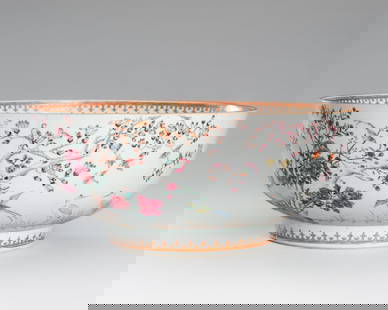 A LARGE FAMILLE ROSE PORCELAIN 'HUNDRED BIRDS' PUNCH BOWL, QING DYNASTY: A LARGE FAMILLE ROSE PORCELAIN 'HUNDRED BIRDS' PUNCH BOWL, QING DYNASTY China, 18th-19th century. Finely painted in polychrome enamels, with highlights of gilt and iron-red, featuring a myriad of bir