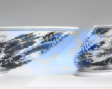 A 'BLEU DE HUE' PORCELAIN BOWL FOR THE VIETNAMESE MARKET, MINH MANG MARK AND PERIOD: A 'BLEU DE HUE' PORCELAIN BOWL FOR THE VIETNAMESE MARKET, MINH MANG MARK AND PERIOD China, 1820-1841. The bowl with deep rounded sides, decorated to the exterior in inky shades of cobalt blue to depic