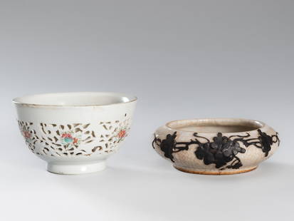 A LOT WITH TWO SMALL CERAMIC VESSELS, c. 1900s: A LOT WITH TWO SMALL CERAMIC VESSELS, c. 1900s China, Republic period (1912-1949). The first a deep bowl rising from a short foot to a slightly flaring rim, the body double-walled and partially reticu