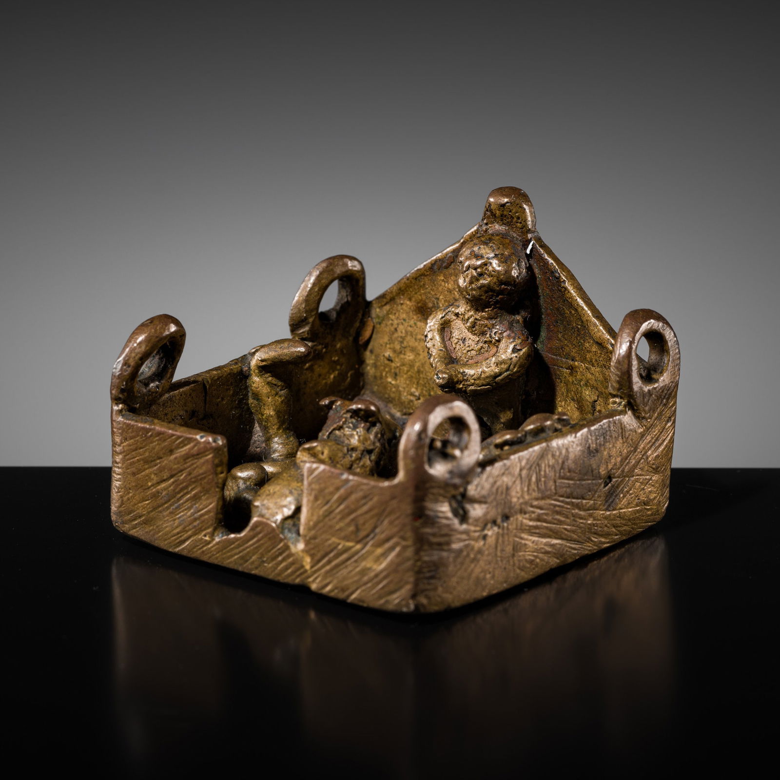 A MINIATURE BRASS SHAIVITE SHRINE, MAHARASHTRA, INDIA, 19TH CENTURY (1 of 9)