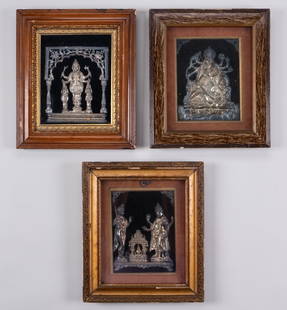 A GROUP OF THREE SILVER REPOUSSÉ RELIEFS, INDIA, c. 1900s: A GROUP OF THREE SILVER REPOUSS&#201; RELIEFS, INDIA, c. 1900s The first depicting a small shrine flanked by Vishnu to the right and Narada-Muni to the left, all raised on a pedestal. The second depic