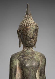 A BRONZE FIGURE OF BUDDHA SHAKYAMUNI, AYUTTAYA STYLE, 19TH CENTURY: A BRONZE FIGURE OF BUDDHA SHAKYAMUNI, AYUTTAYA STYLE, 19TH CENTURY Thailand, 19th century or earlier. Standing in samabhanga with both hands stretching down to his sides, palms facing the body. The el