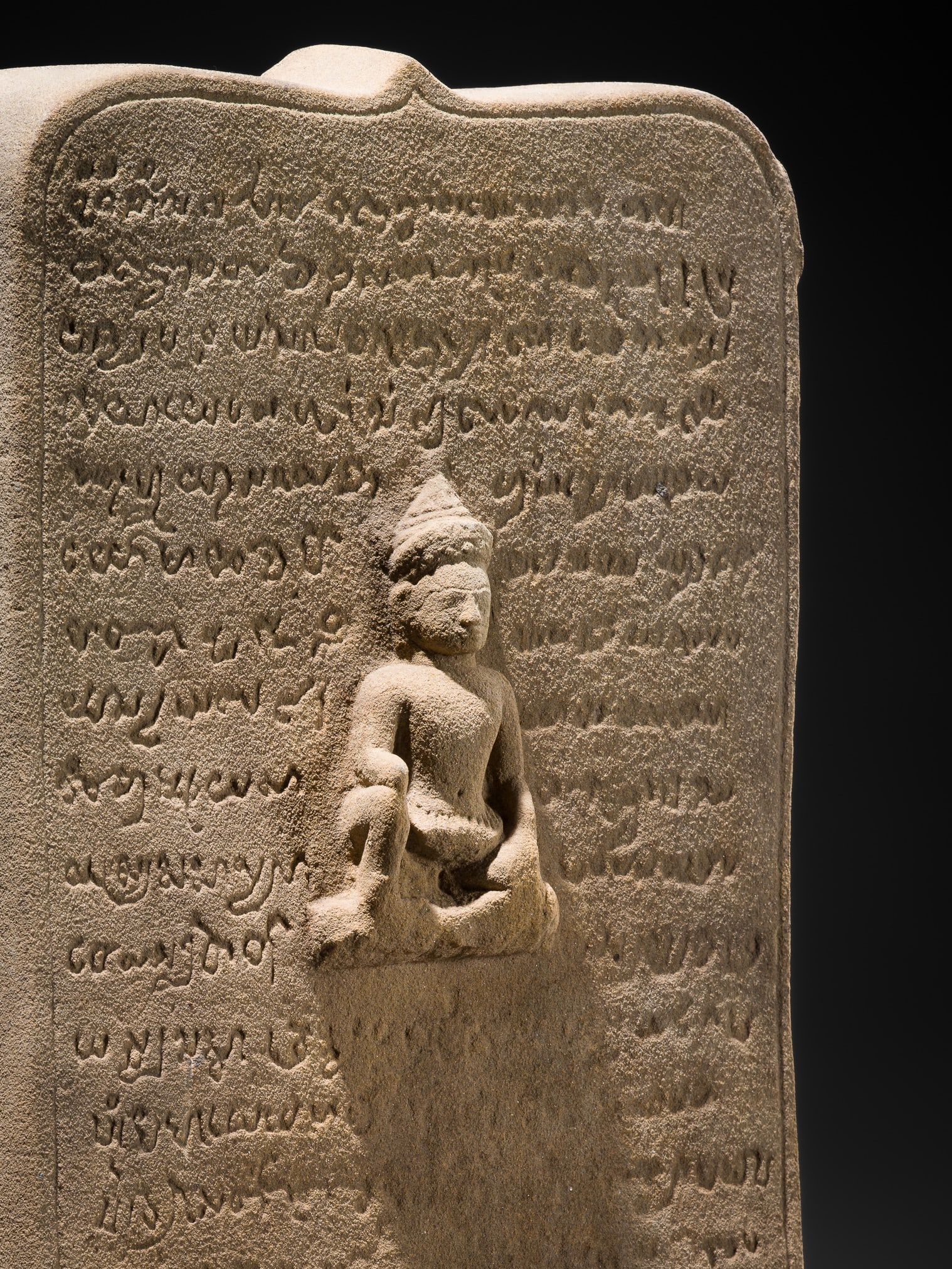 A RARE KHMER SANDSTONE INSCRIBED STELE, BAPHUON PERIOD, 11TH CENTURY