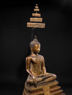 A VERY LARGE (187 CM HIGH) GILT-LACQUERED FIGURE OF BUDDHA SHAKYAMUNI WITH CANOPY, RATTANAKOSIN: A VERY LARGE (187 CM HIGH) GILT-LACQUERED FIGURE OF BUDDHA SHAKYAMUNI WITH CANOPY, RATTANAKOSIN PERIOD  This lot is a museum deaccession and is therefore offered without reserve Thailand, reign of Kin