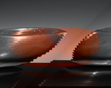 A LARGE STONE BOAT-SHAPED MORTAR, 18TH-19TH CENTURY: A LARGE STONE BOAT-SHAPED MORTAR, 18TH-19TH CENTURY  This lot is a museum deaccession and is therefore offered without reserve India. Of elliptical form with concave interior and rounded sides support
