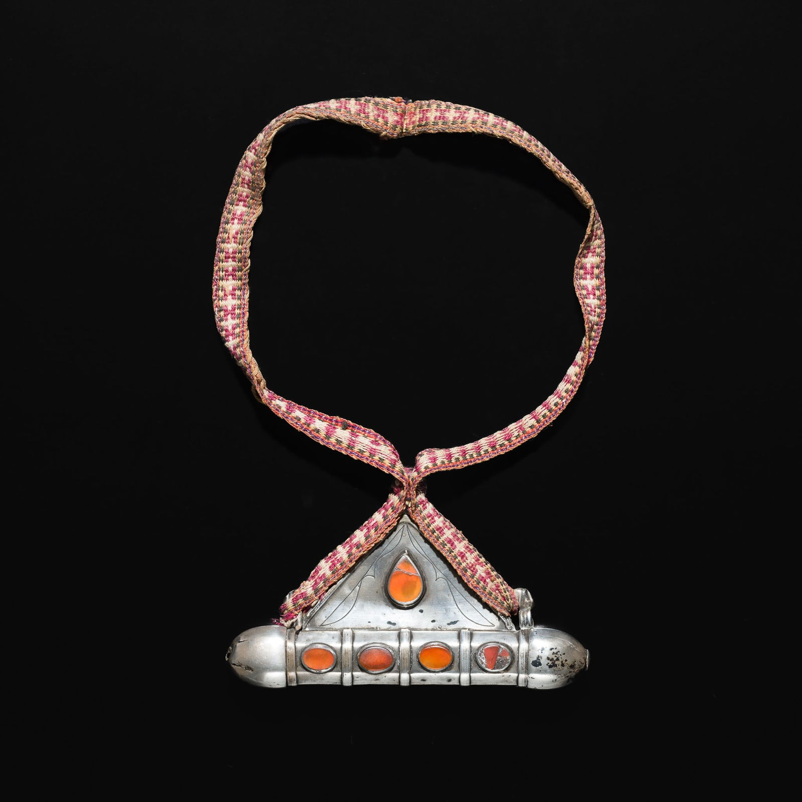 A TURKMEN CARNELIAN-INLAID METAL AMULET HOLDER, TUMAR, 19TH-EARLY 20TH CENTURY (1 of 9)