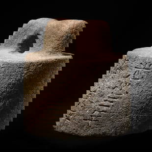 AN INSCRIBED OFFICIAL STONE WEIGHT FOR THE TRIBUTE TRANSPORT, CAOYUN TUOCHEN, DATED 900: AN INSCRIBED OFFICIAL STONE WEIGHT FOR THE TRIBUTE TRANSPORT, CAOYUN TUOCHEN, DATED 900 This lot is a museum deaccession and is therefore offered without reserve China. The weight of cylindrical form