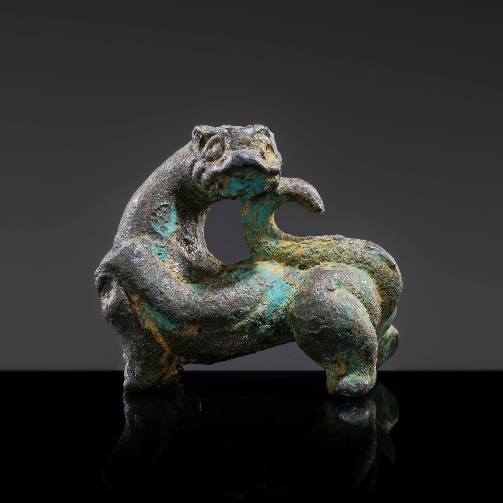 A BRONZE FIGURE OF A LEOPARD, WARRING STATES PERIOD