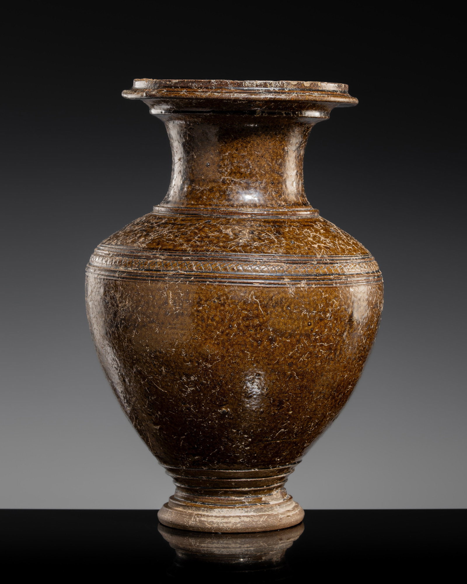 A LARGE DARK BROWN GLAZED STONEWARE BALUSTER JAR, ANGKOR PERIOD (1 of 12)