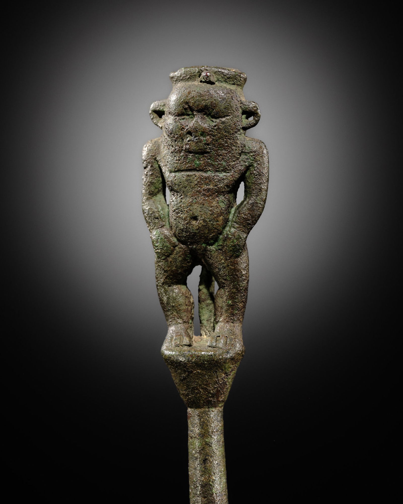 A BRONZE FIGURE OF BES, LATE PERIOD TO PTOLEMAIC ERA