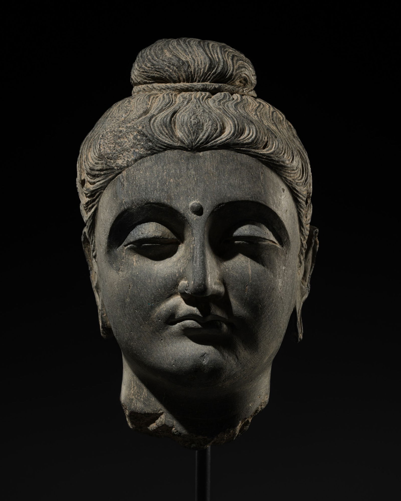 A GRAY SCHIST HEAD OF BUDDHA, ANCIENT REGION OF GANDHARA, 3RD-4TH CENTURY (1 of 13)