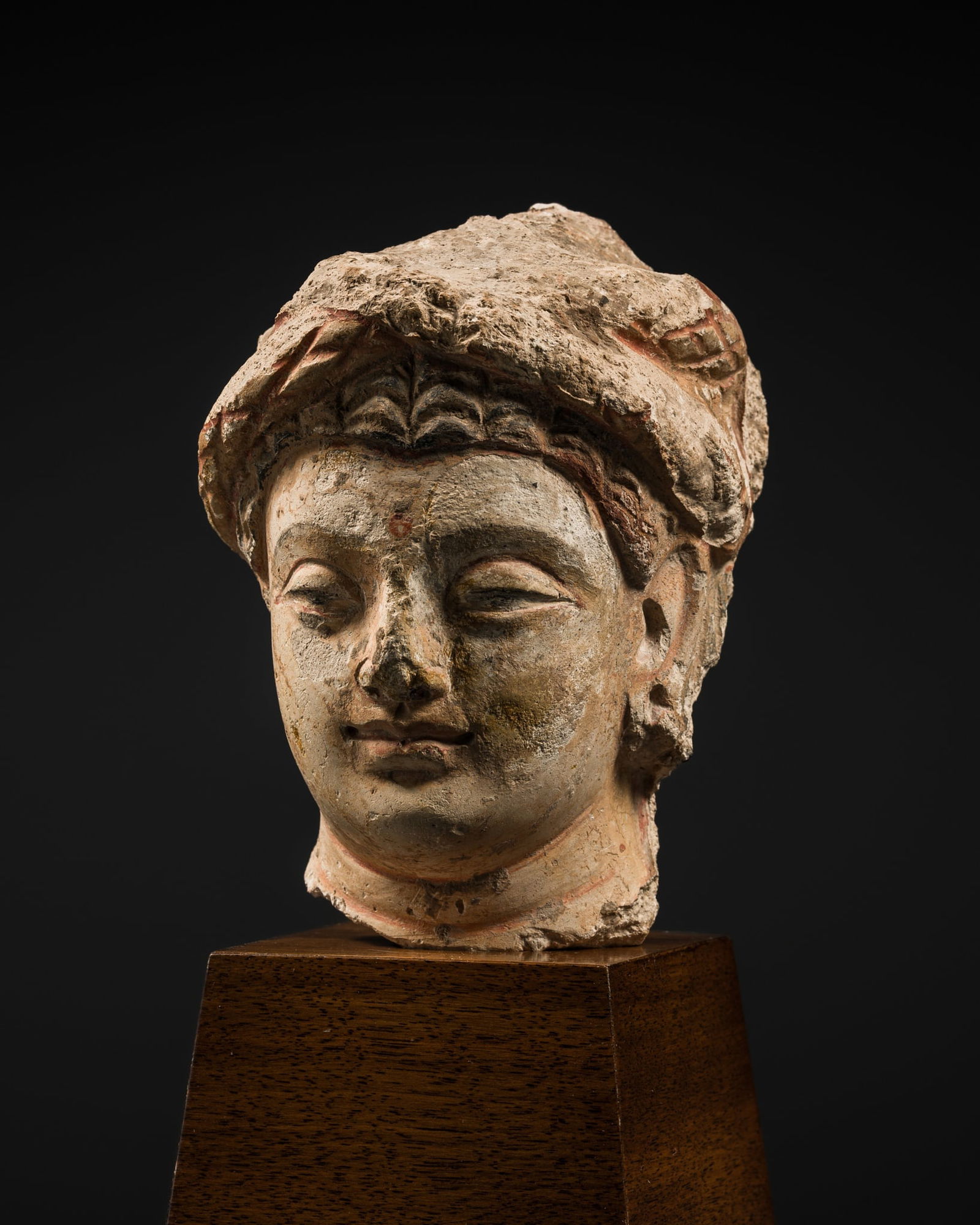 A POLYCHROME STUCCO HEAD OF A TURBANED BODHISATTVA, ANCIENT REGION OF GANDHARA, 4TH CENTURY (1 of 8)