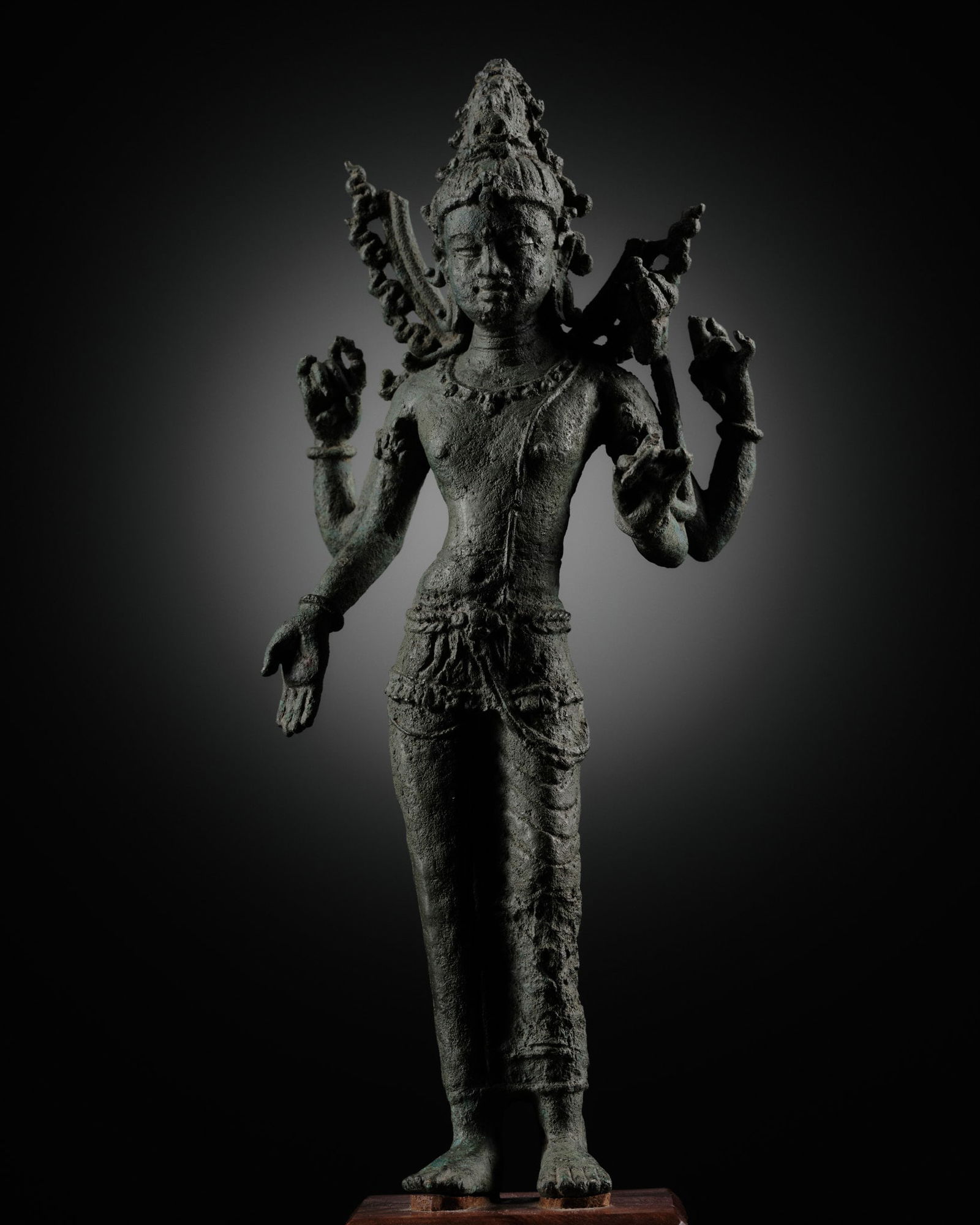 A BRONZE FIGURE OF AVALOKITESHVARA, SRIVIJAYA, 7TH-10TH CENTURY (1 of 12)