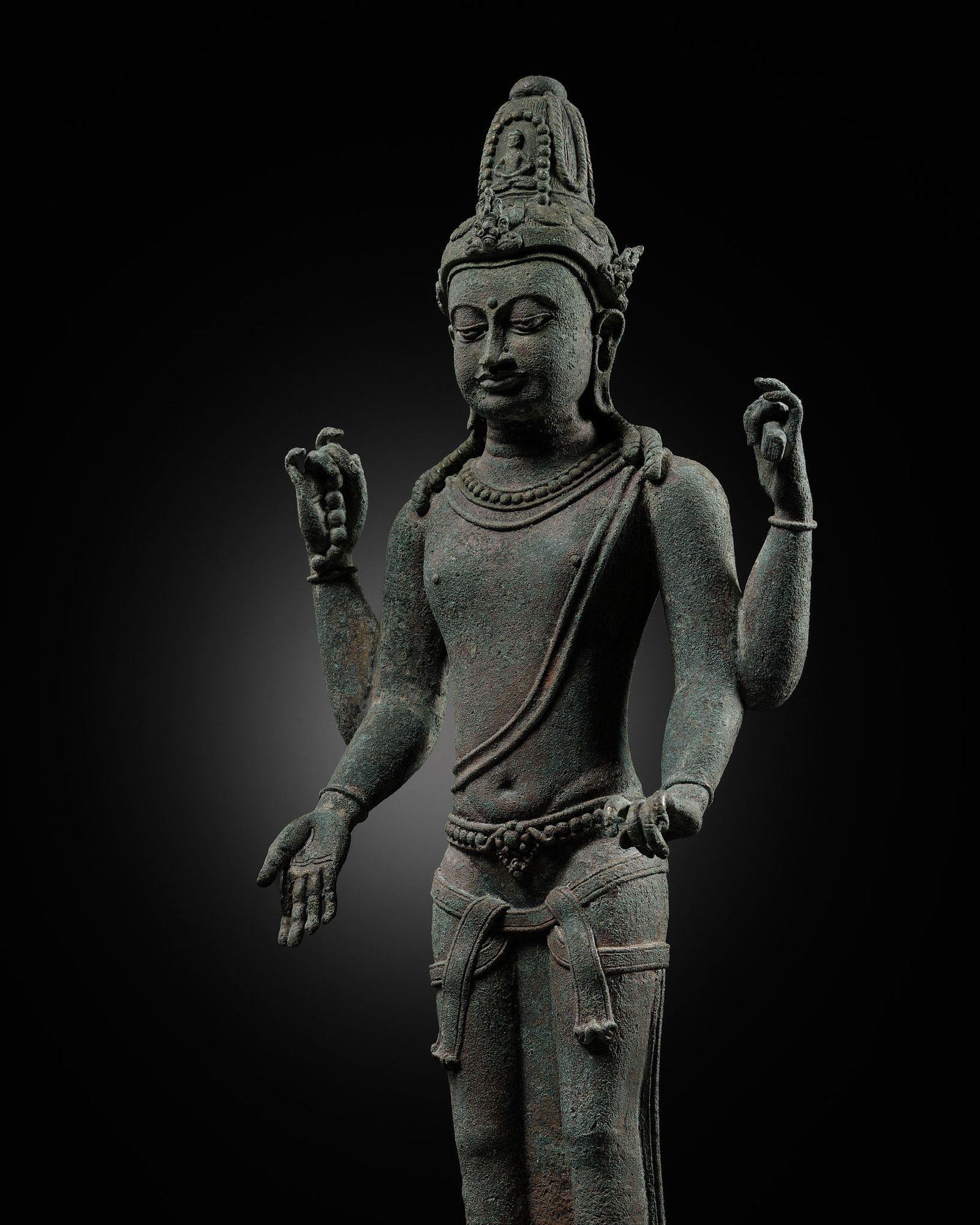A LARGE BRONZE FIGURE OF AVALOKITESHVARA, SRIVIJAYA EMPIRE, 9TH-11TH CENTURY (1 of 13)