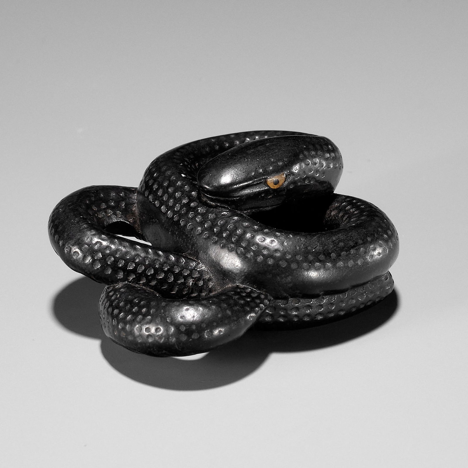 A RARE EBONY WOOD NETSUKE OF COILED SNAKE (1 of 11)