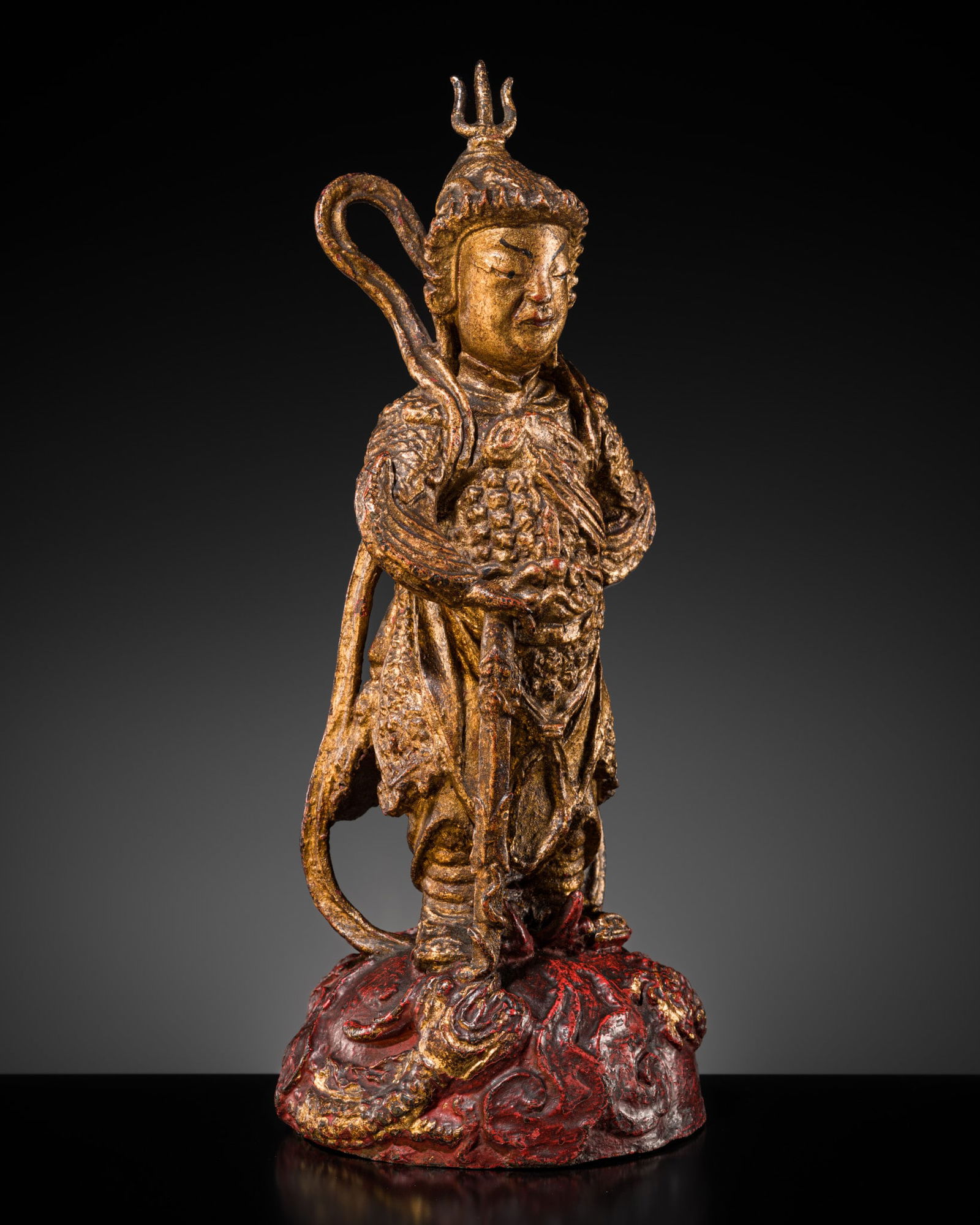 A RED AND GILT-LACQUERED BRONZE FIGURE OF WEITUO PUSA, MING DYNASTY (1 of 11)