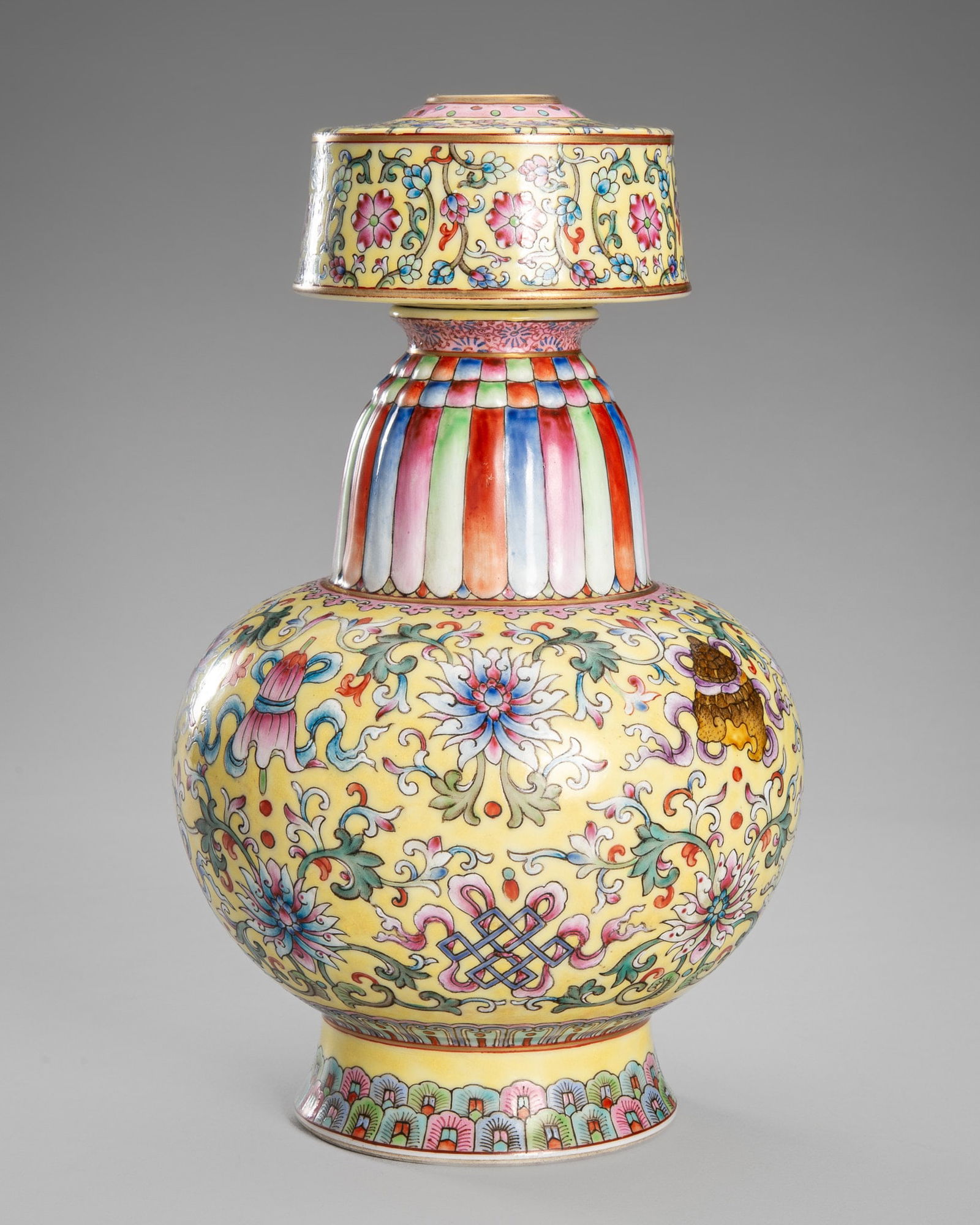 A YELLOW-GROUND FAMILLE ROSE TIBETAN-STYLE VASE, BENBAPING (1 of 15)