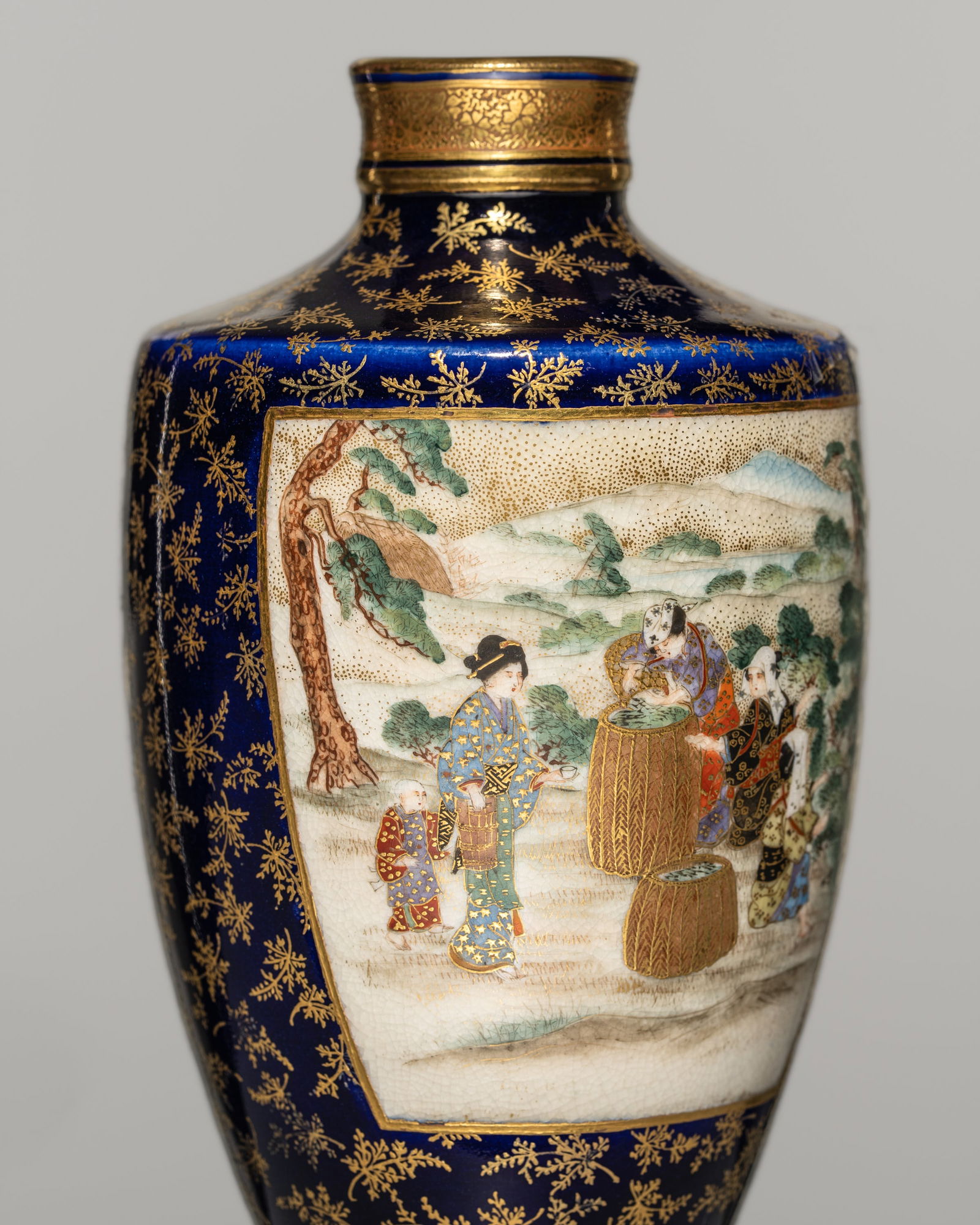 KINKOZAN: A FINE SATSUMA CERAMIC VASE: KINKOZAN: A FINE SATSUMA CERAMIC VASE By the Kinkozan workshop, sealed Kinkozan zoJapan, Meiji period (1868-1912)Finely potted, the baluster vase gently tapering towards the foot and rising to high-an