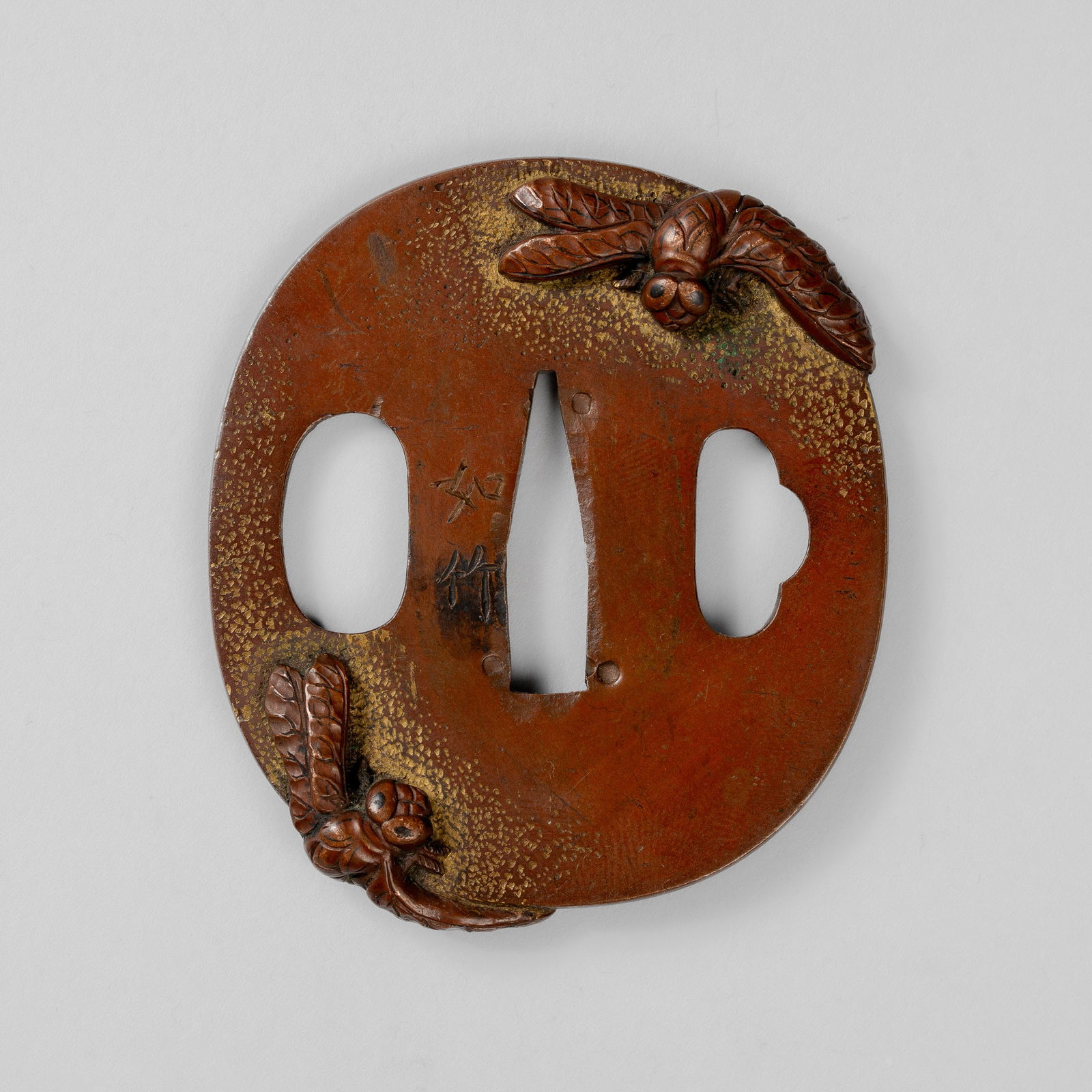 JOCHIKU: A KINKO COPPER TSUBA WITH TOMBO (DRAGONFLY): JOCHIKU: A KINKO COPPER TSUBA WITH TOMBO (DRAGONFLY) Attributed to Murakami Jochiku, signed Jochiku 如竹Japan, 19th centuryOf nagamarugata form, with a kozuka and a kogai hitsu-ana, well c