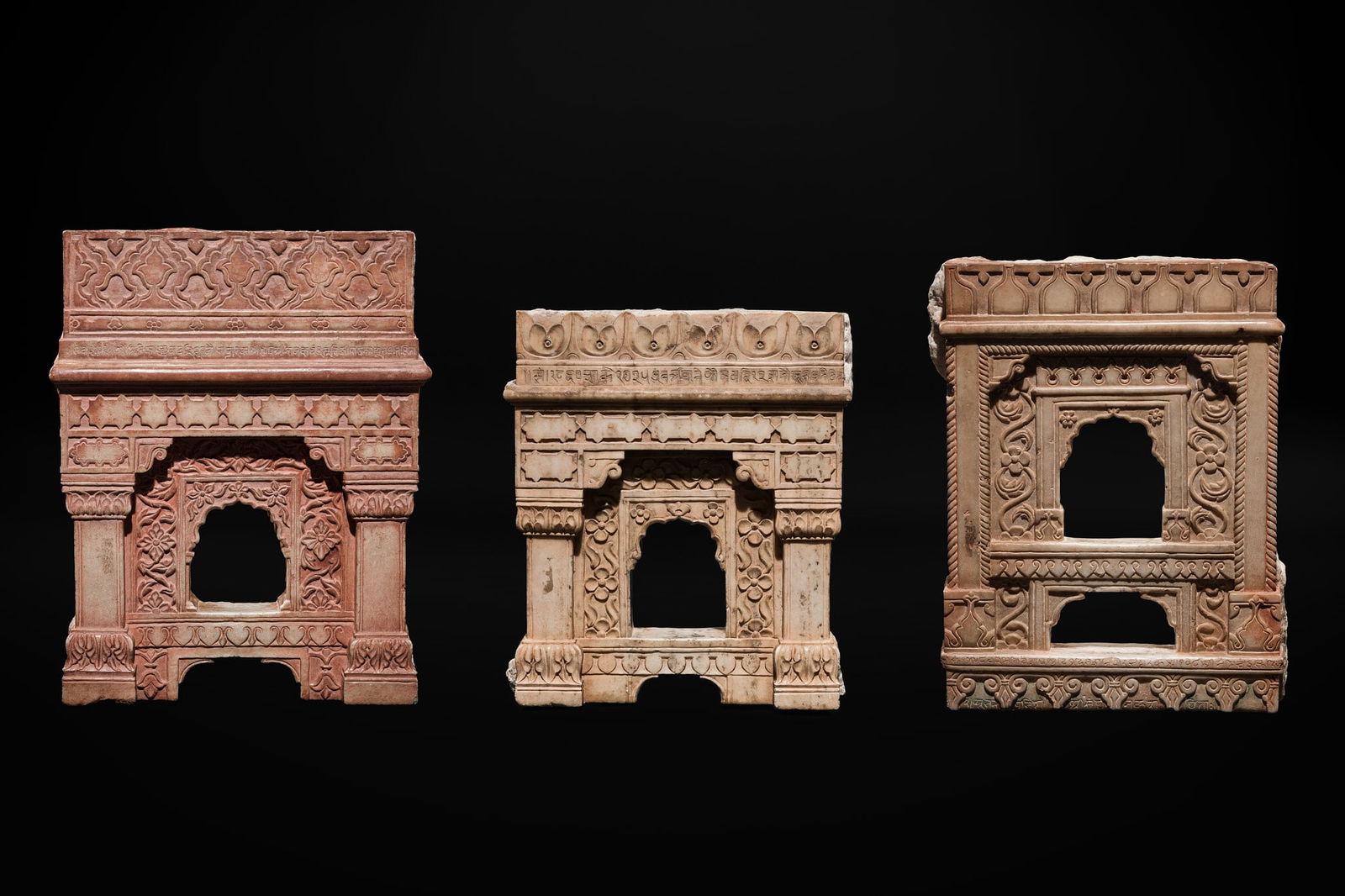 A GROUP OF THREE MUGHAL MARBLE 'CHINI-KHANA' PANELS: A GROUP OF THREE MUGHAL MARBLE 'CHINI-KHANA' PANELS Northern India, 17th-18th century. Each panel skillfully carved in the form of an aedicule, with robust pilasters of rectangular section and squat c