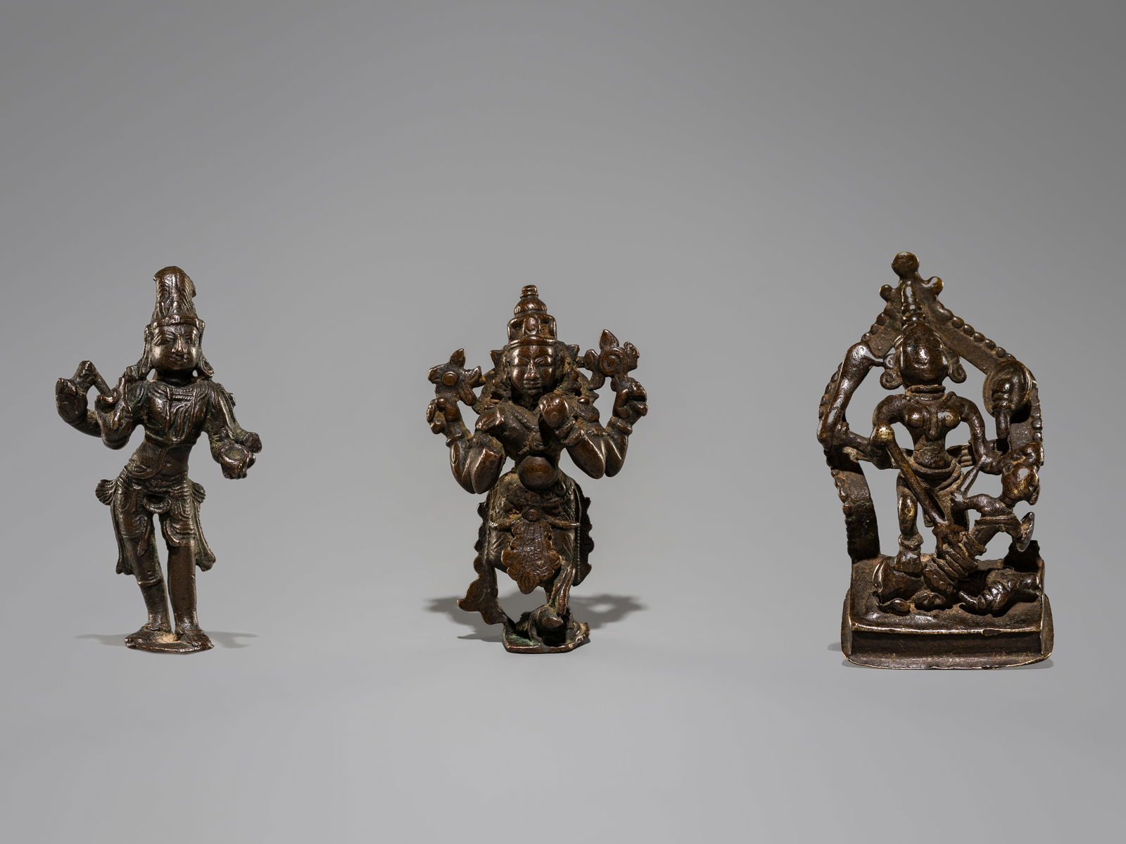 A LOT WITH THREE INIDAN BRONZE FIGURES, 18TH-19TH CENTURY (1 of 18)
