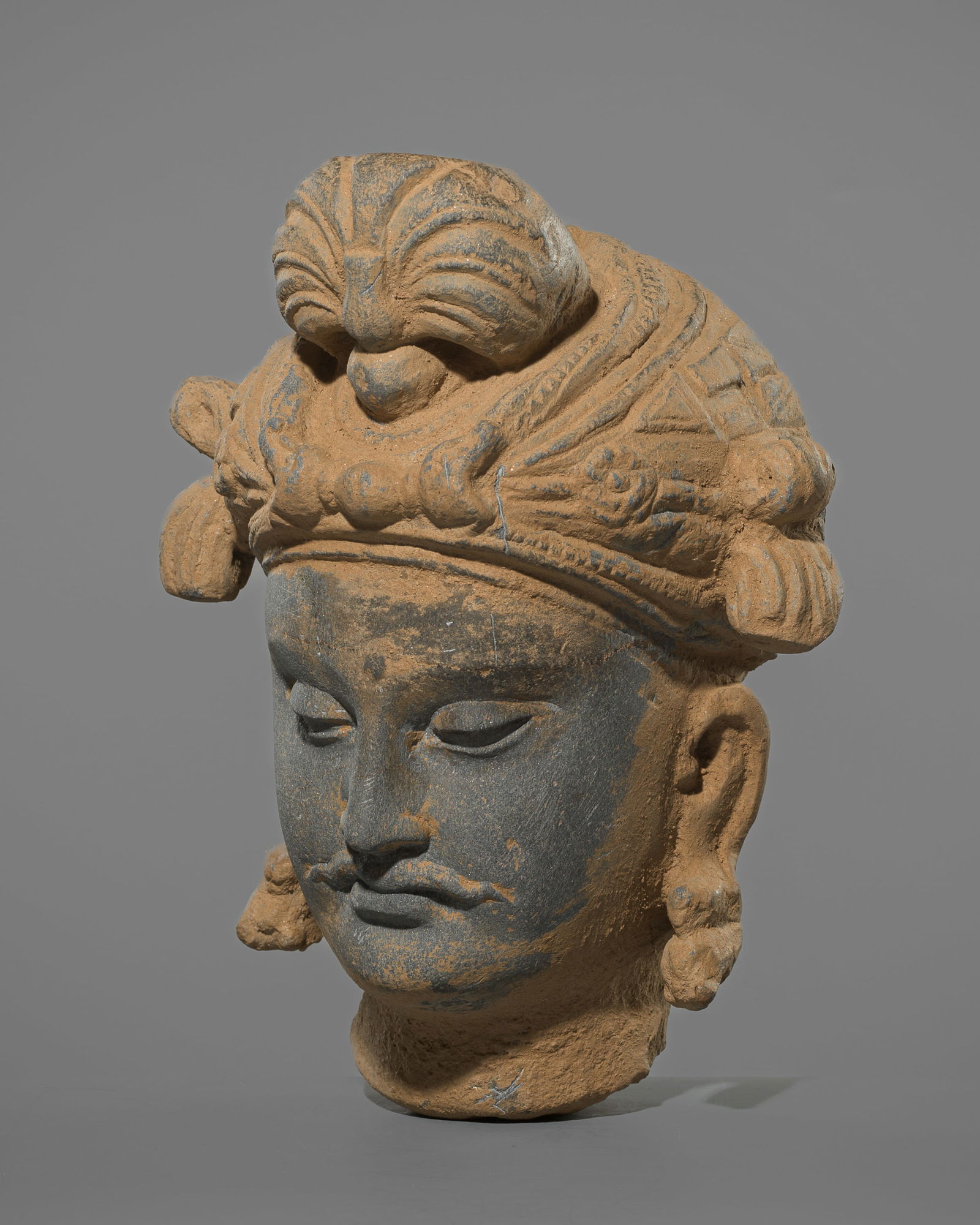 A GREY SCHIST HEAD OF A BODHISATTVA, GANDHARA STYLE (1 of 8)