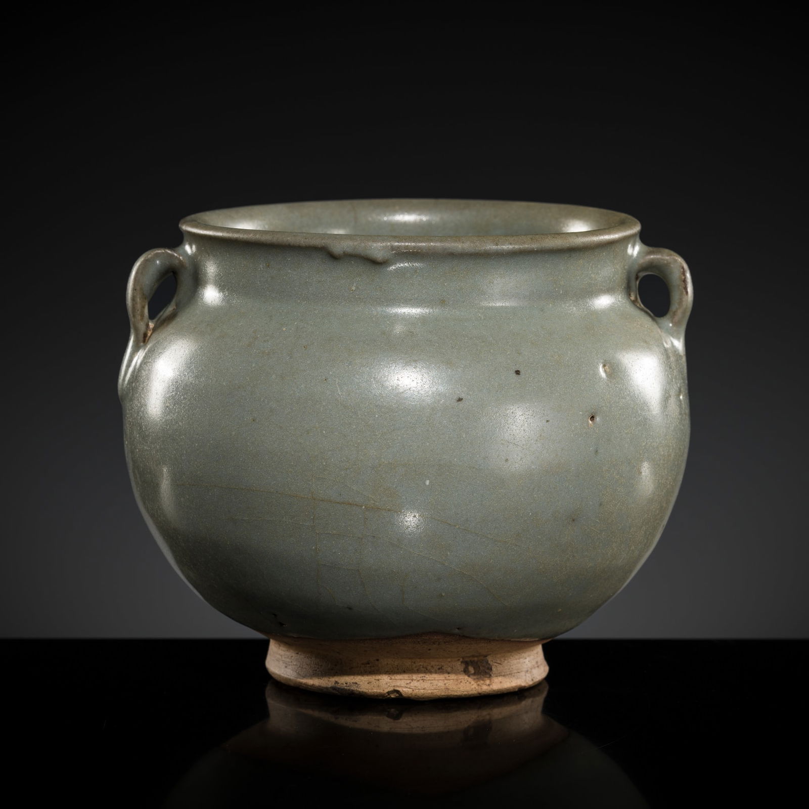 A FINE JUN GLAZED TWIN-HANDLED JAR, JIN DYNASTY: A FINE JUN GLAZED TWIN-HANDLED JAR, JIN DYNASTY China, 1115-1234. Well potted with deep rounded sides supported on a gently spreading foot and rising to a broad shoulder and straight rim with a gentl