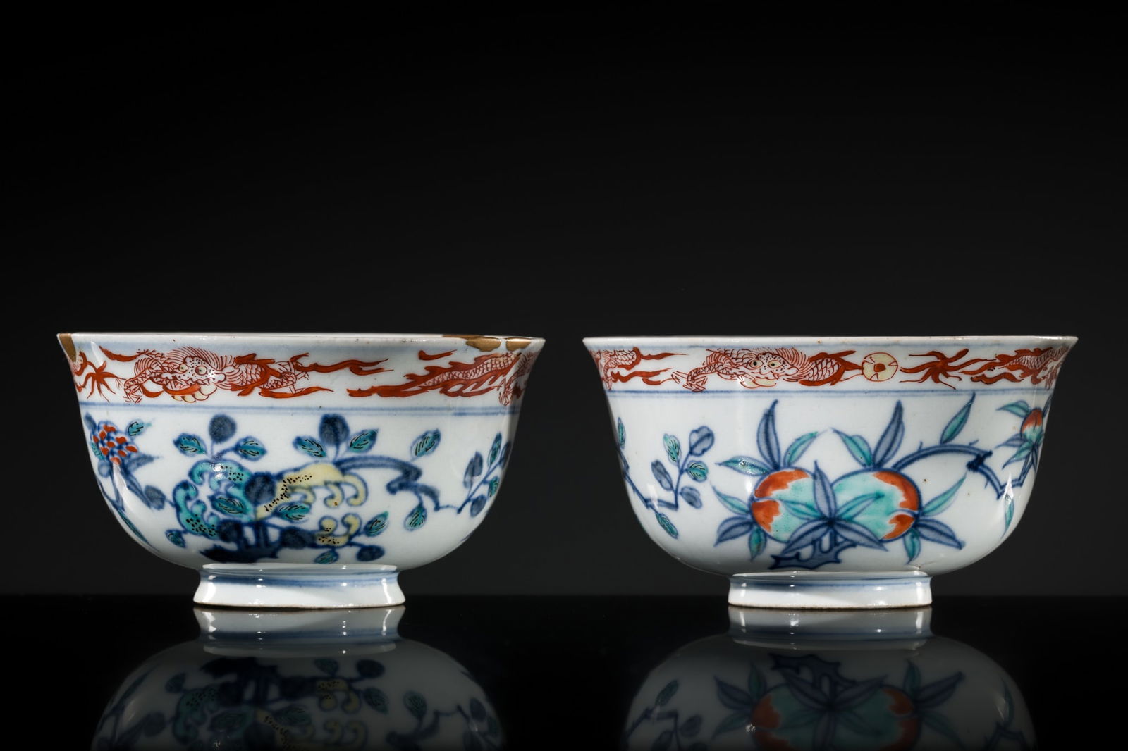AN EXTREMELY RARE PAIR OF DOUCAI 'SANDUO' BOWLS, 16TH TO 17TH CENTURY: AN EXTREMELY RARE PAIR OF DOUCAI 'SANDUO' BOWLS, 16TH TO 17TH CENTURY China, circa 1540-1680. Each finely potted with rounded sides rising to a gently everted mouth rim, delicately painted on the ext