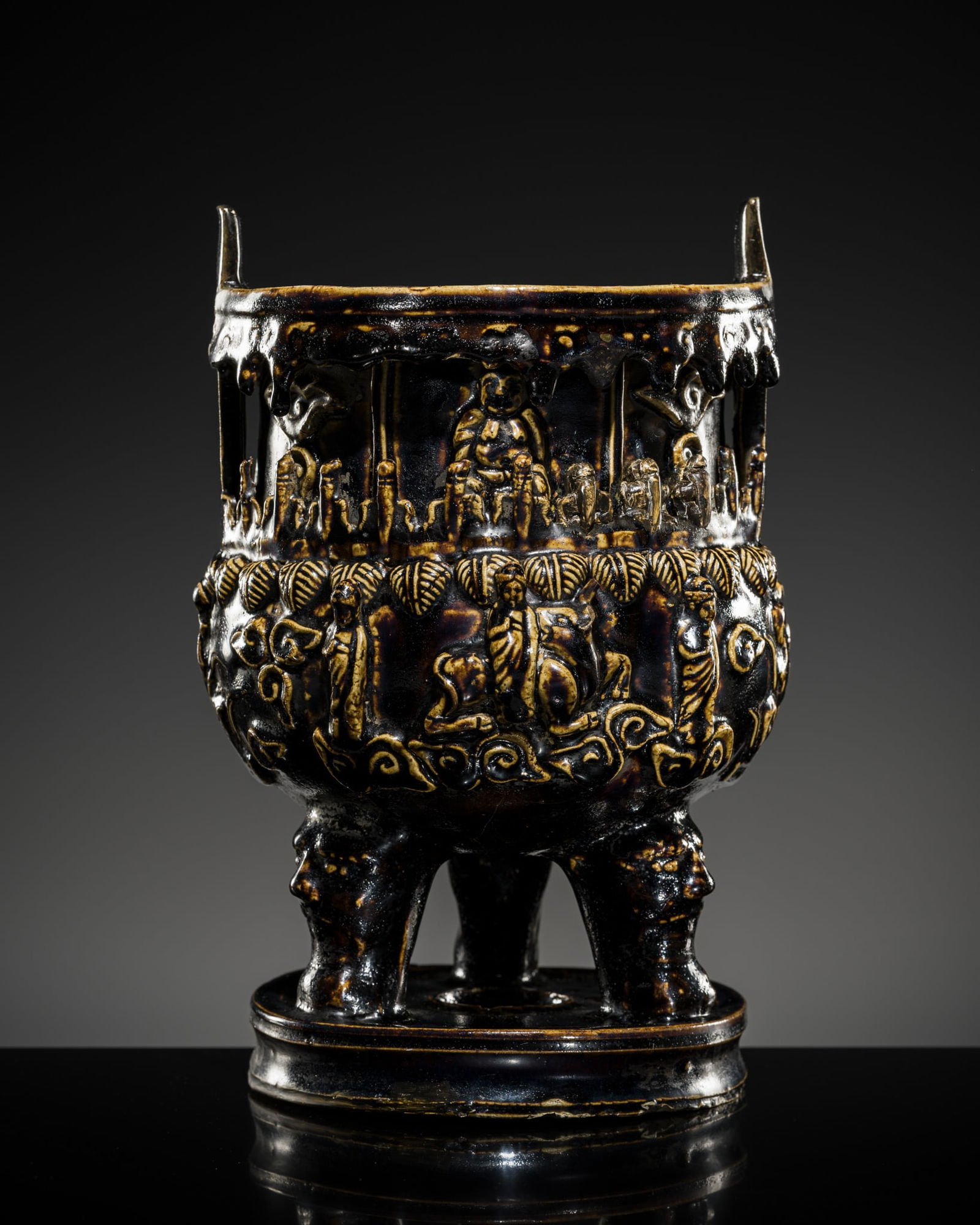 AN ARCHAISTIC BROWN-GLAZED STONEWARE STEAMER (YAN), LATE MING TO EARLY QING DYNASTY: AN ARCHAISTIC BROWN-GLAZED STONEWARE STEAMER (YAN), LATE MING TO EARLY QING DYNASTY China, circa 17th century. Heavily potted, the upper cauldron with deep, rounded sides supported on three s