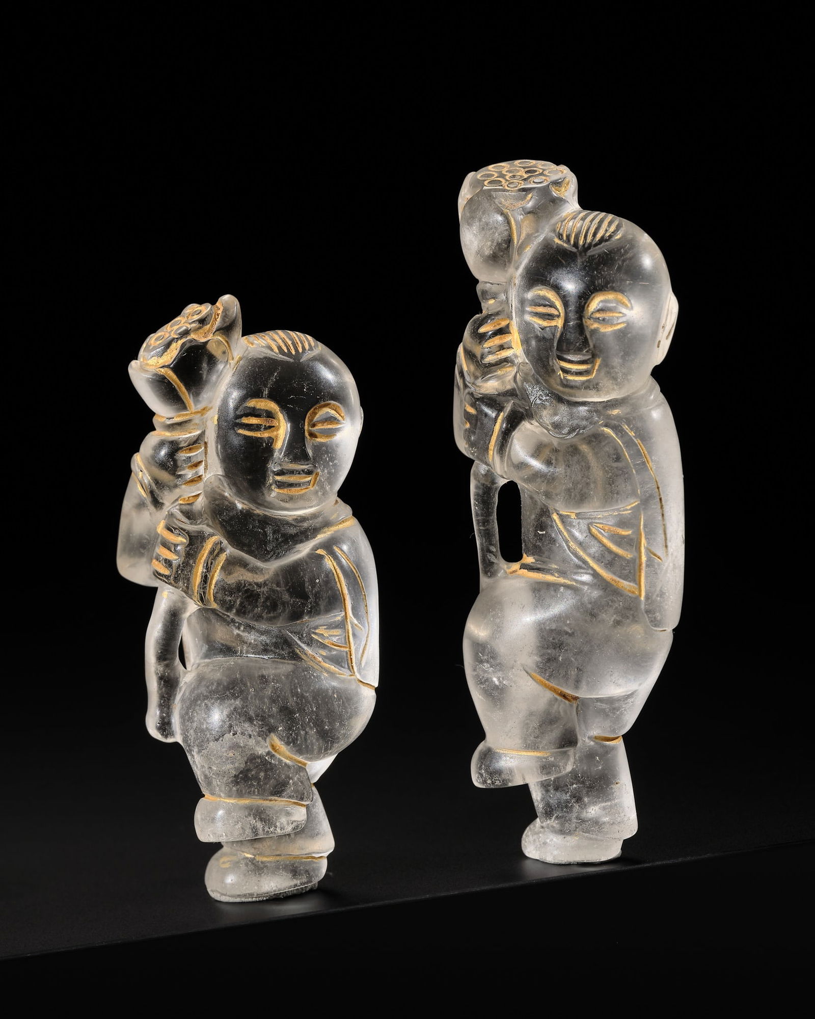 A PAIR OF ROCK CRYSTAL 'BOYS AND LOTUS' CARVINGS, LIAO DYNASTY: A PAIR OF ROCK CRYSTAL 'BOYS AND LOTUS' CARVINGS, LIAO DYNASTY Published: Myrna Myers (ed.) & Filippo Salviati (auth.), The Language of Adornment. Chinese Ornaments of Jade, Crystal