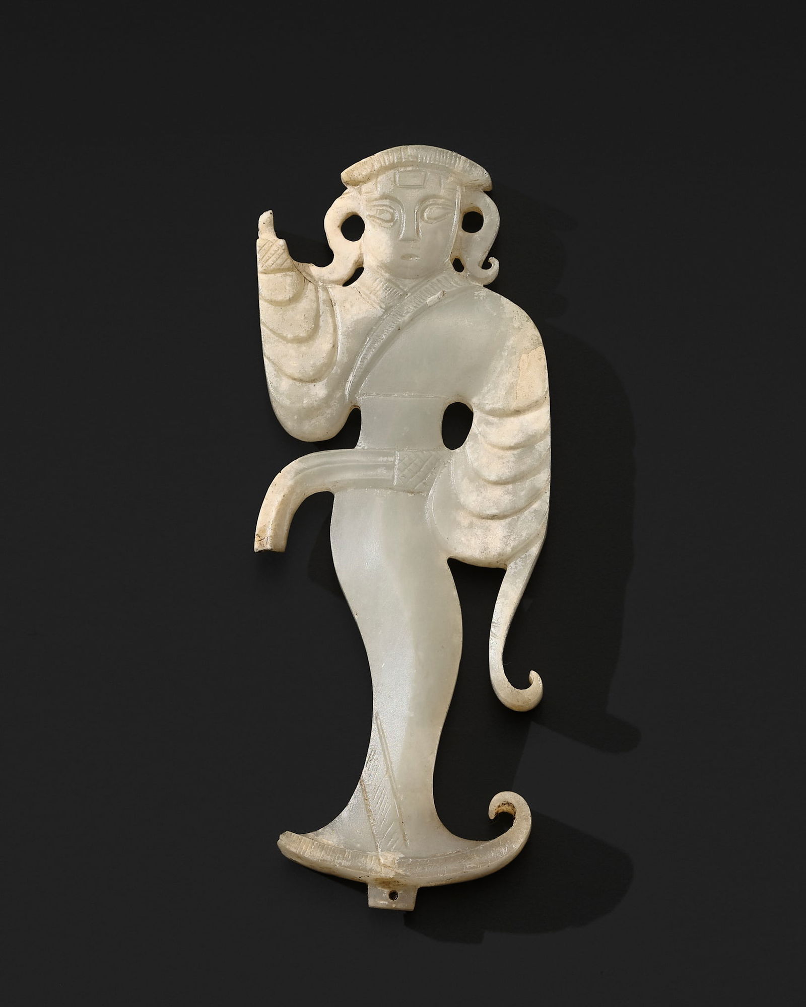 A MAGNIFICENT WHITE JADE 'FEMALE DANCER' PENDANT, EASTERN ZHOU TO WESTERN HAN DYNASTY: A MAGNIFICENT WHITE JADE 'FEMALE DANCER' PENDANT, EASTERN ZHOU TO WESTERN HAN DYNASTY China, 3rd-2nd century BC. The pendant meticulously carved in the form of a dancing lady perfo