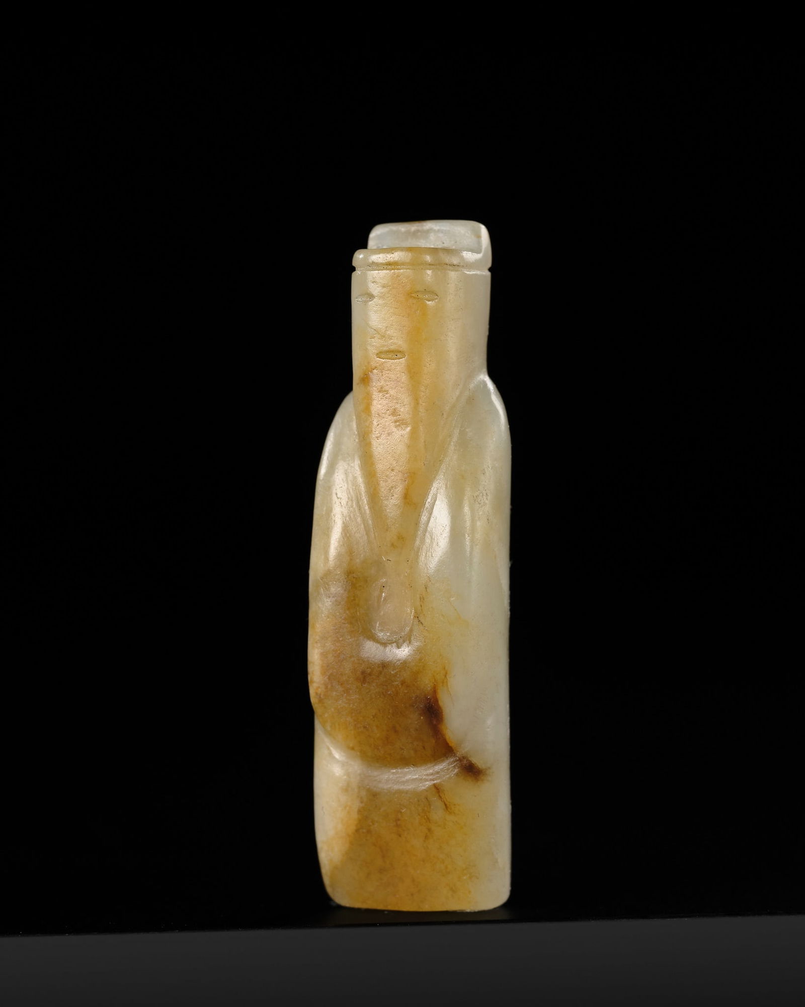 A SMALL PALE CELADON AND RUSSET JADE PENDANT OF A BEARDED MAN, WESTERN HAN DYNASTY (1 of 17)