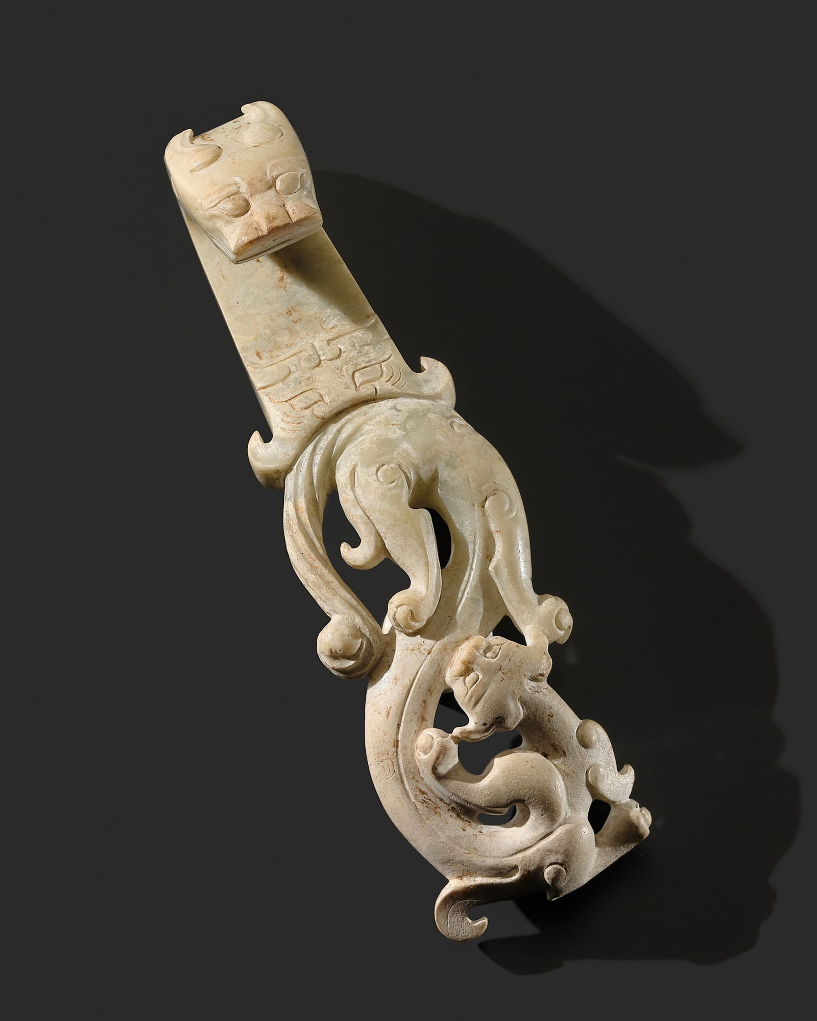 A JADE BELT HOOK, EARLY WESTERN HAN DYNASTY: A JADE BELT HOOK, EARLY WESTERN HAN DYNASTY Published:1. Myrna Myers (ed.) & Filippo Salviati (auth.), Radiant Stones. Archaic Chinese Jades, Paris, 2000, no. 143.2. Jea